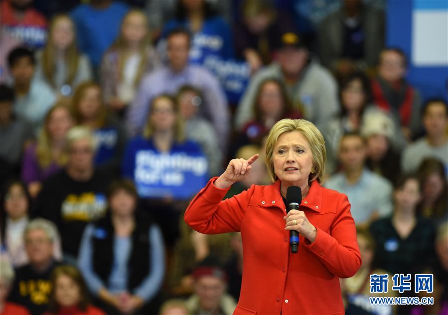 美国总统选举民主党首场预选:希拉里险胜桑德斯(图1) W020160203263720409875.jpg