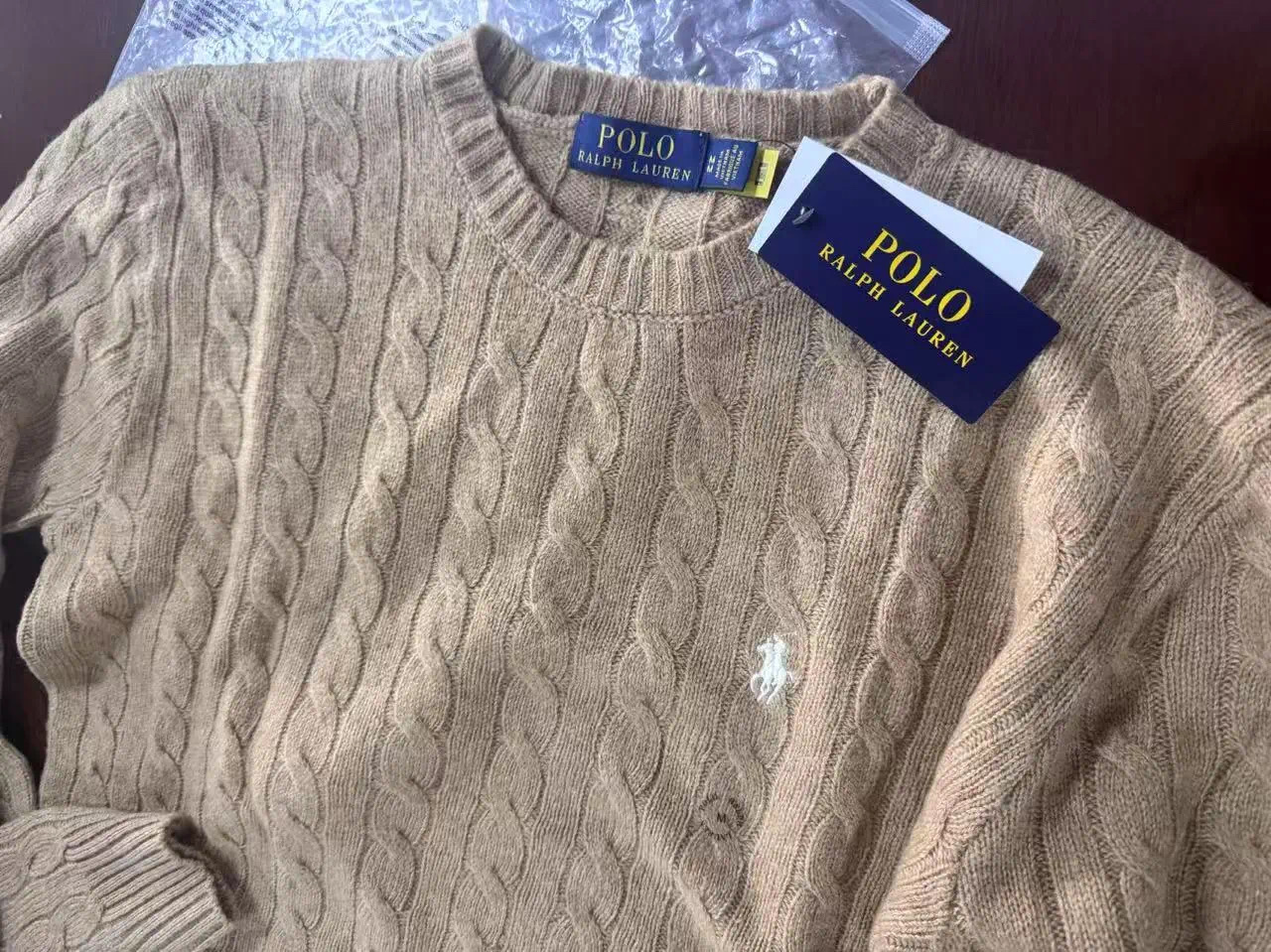 七折拉夫劳伦香港发货?警方揭秘“全球购”造假内幕(图2) 微信图片_20250223222432.jpg